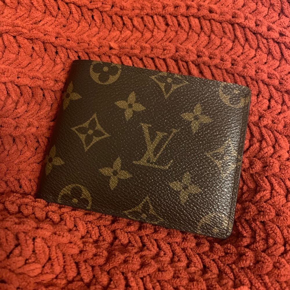SOLD LOUIS VUITTON MONOGRAM MULTIPLE WALLET